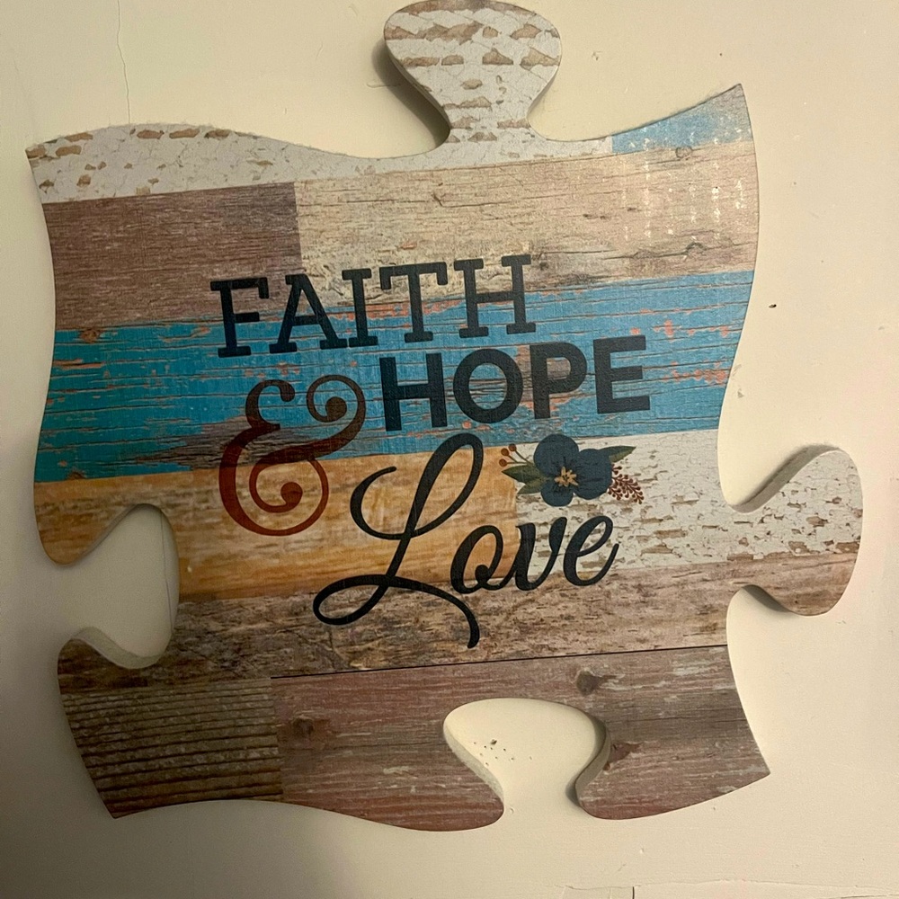Wall decor in the shape of a puzzle piece